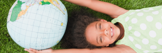 Child with a globe
